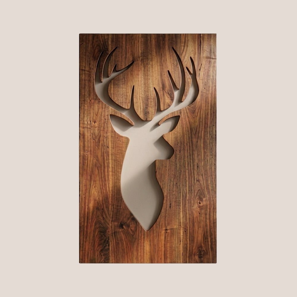 A deer head silhouette wall art piece cutout, set against a rustic brown wood plank background, centered on a solid light beige backdrop.